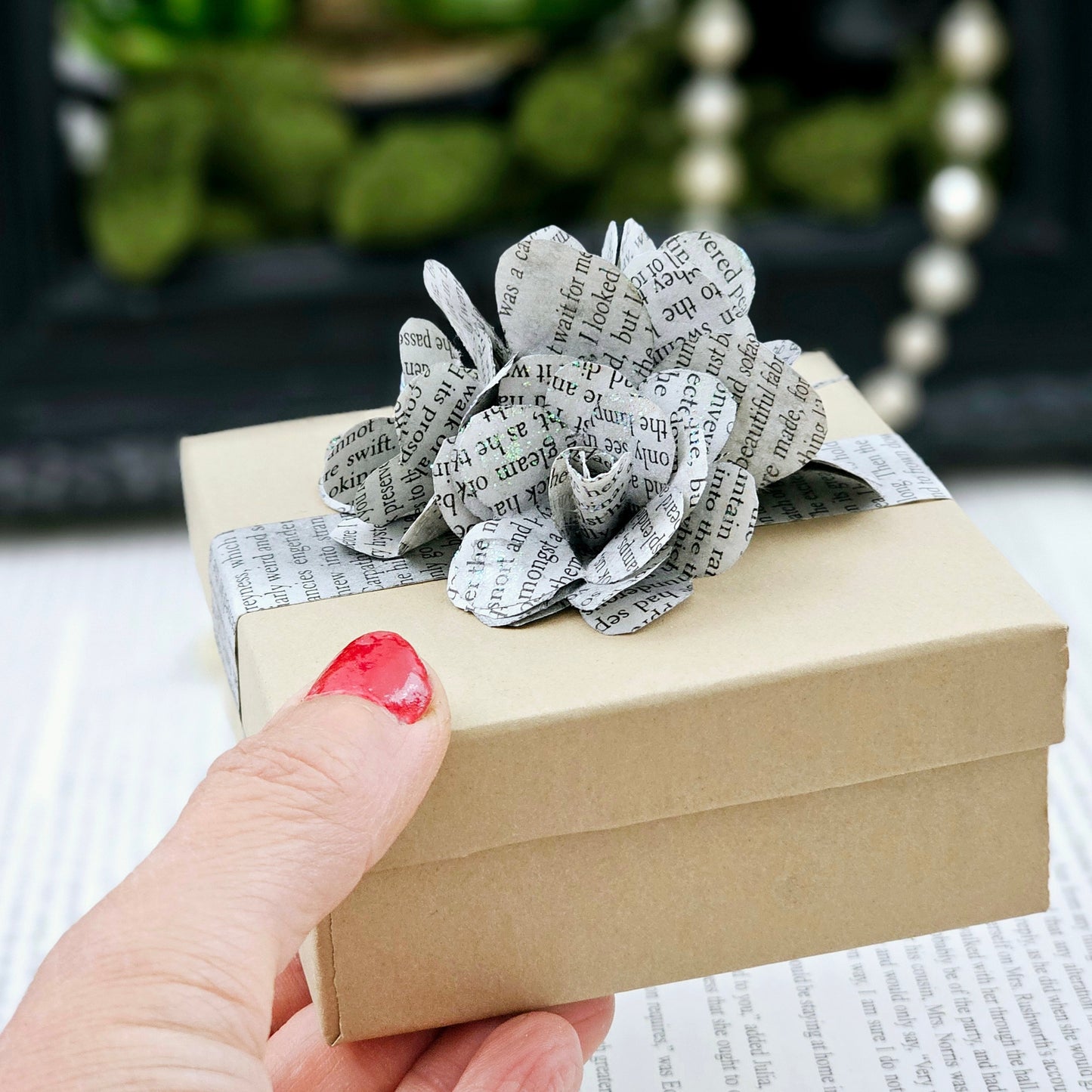 Jewelry Box, 3.5x3.5, adorned with 3 book page roses, handcrafted, the pages are gently stained black, slight sparkle on the end of the flowers