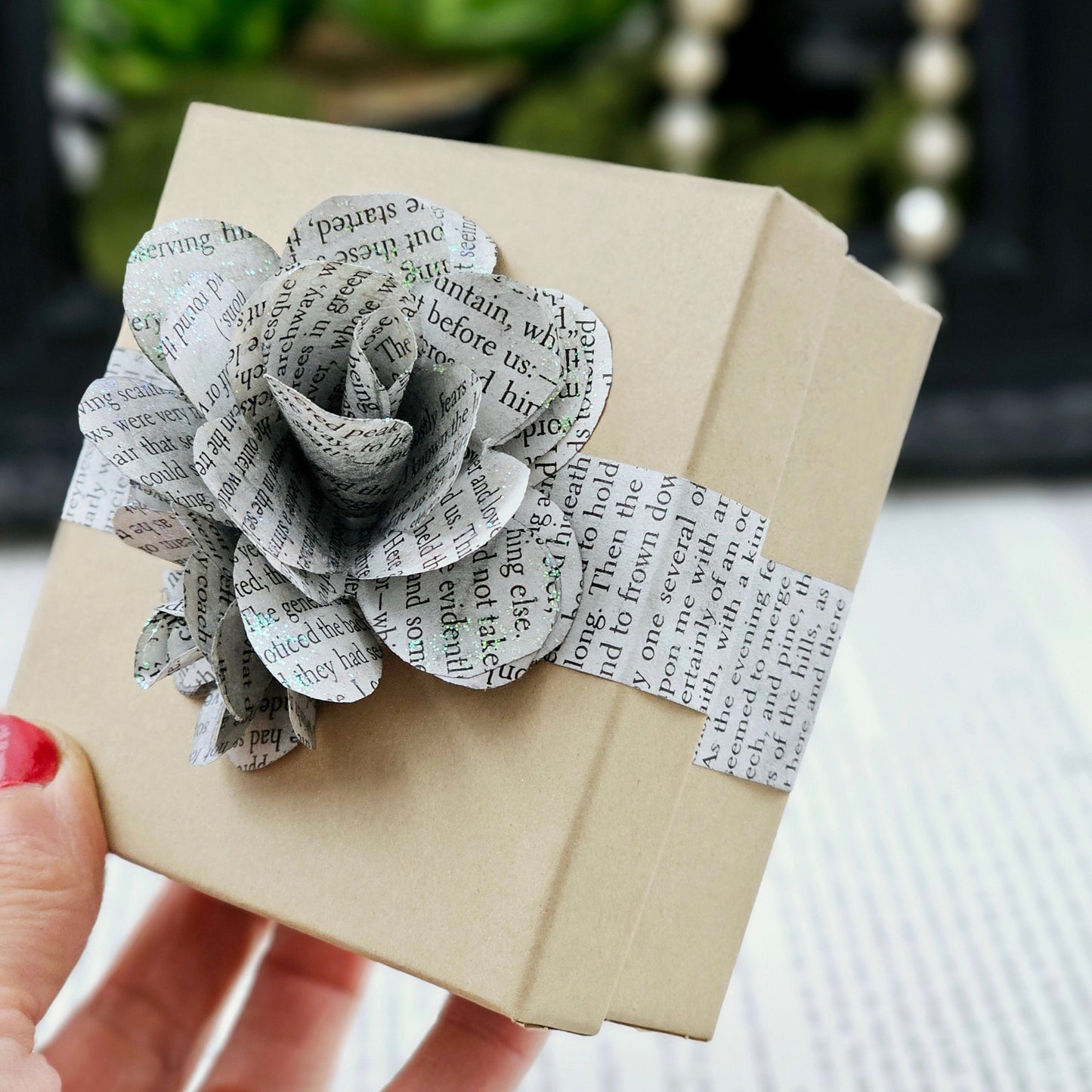 Jewelry Box, 3.5x3.5, adorned with 3 book page roses, handcrafted, the pages are gently stained black, slight sparkle on the end of the flowers
