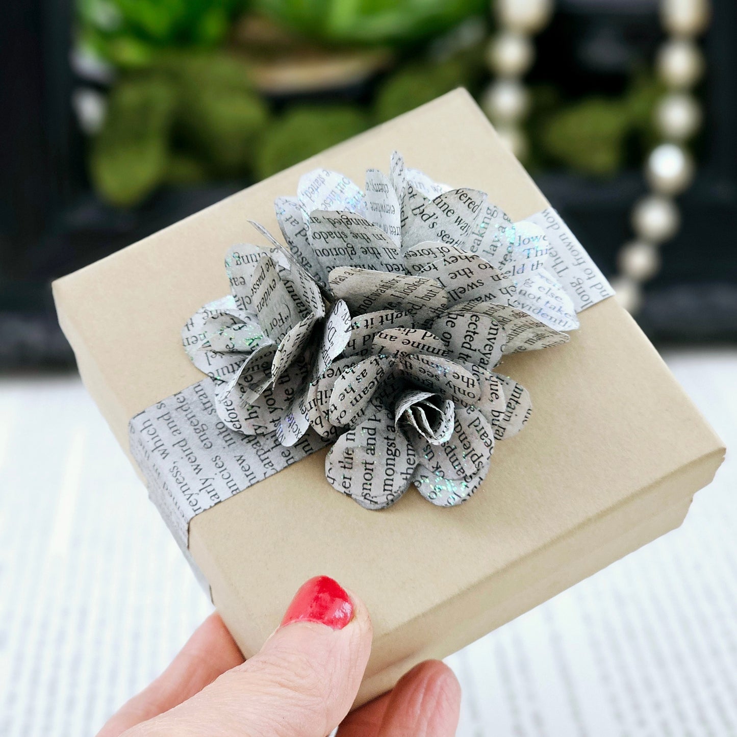 Jewelry Box, 3.5x3.5, adorned with 3 book page roses, handcrafted, the pages are gently stained black, slight sparkle on the end of the flowers