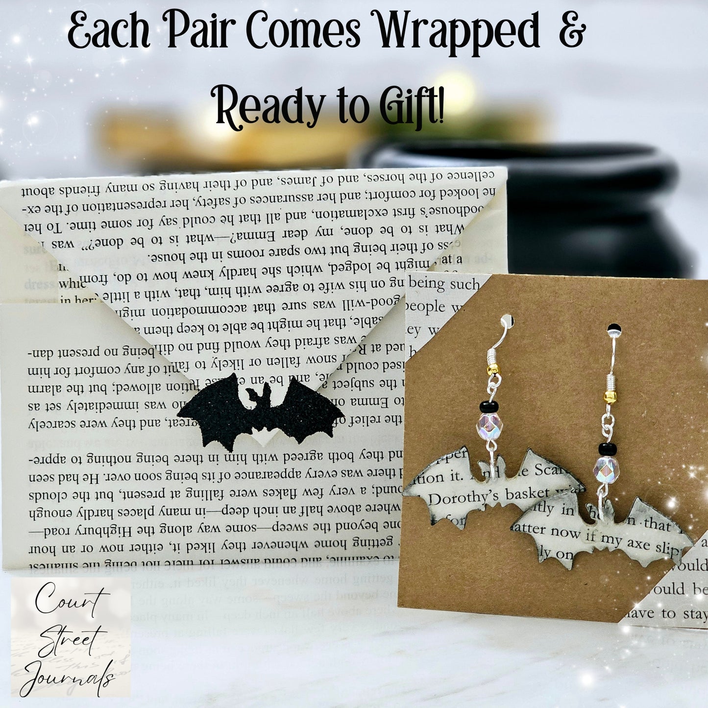 Bat Book Page earrings come in a gifting envelope made from book pages.