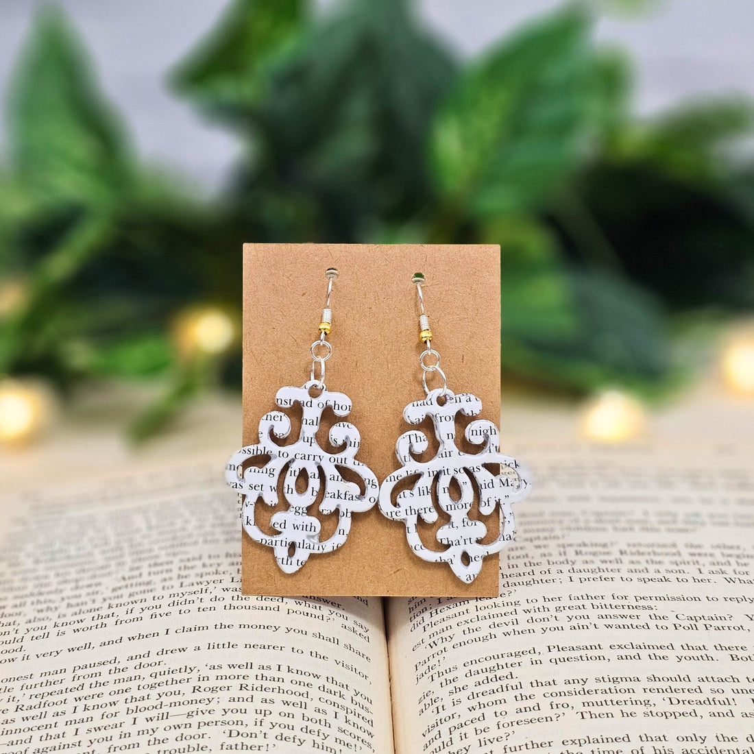 Artisan made stencil design book page earrings for gifts for teachers, book lovers and librarians.