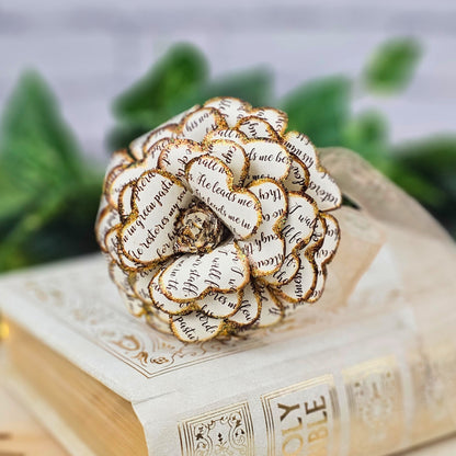 Close-up detail of Psalm 23 scripture on handcrafted paper rose petals