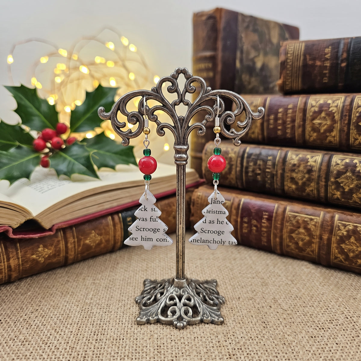 Earrings displayed on a stand