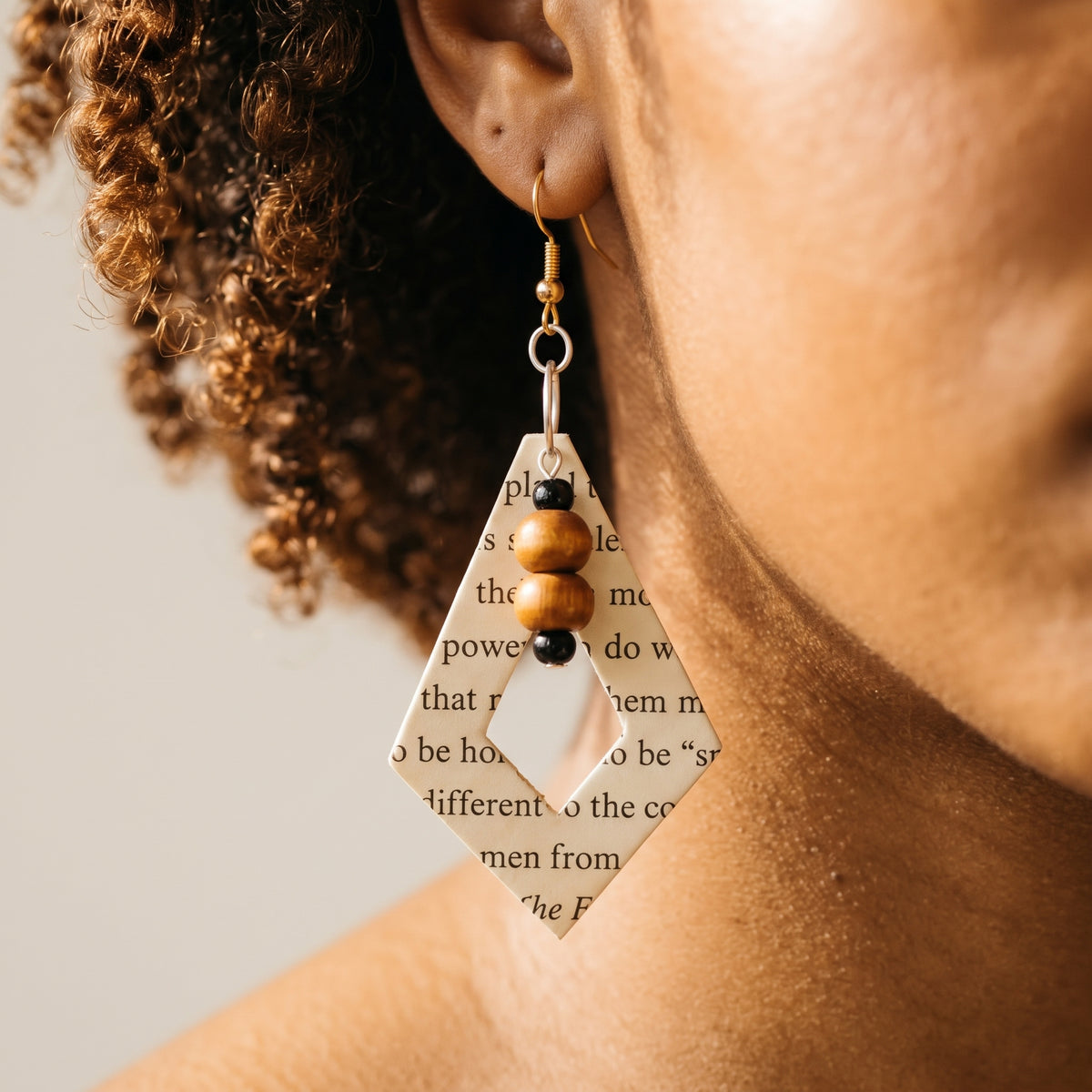 Book lover earrings made from upcycled book pages
