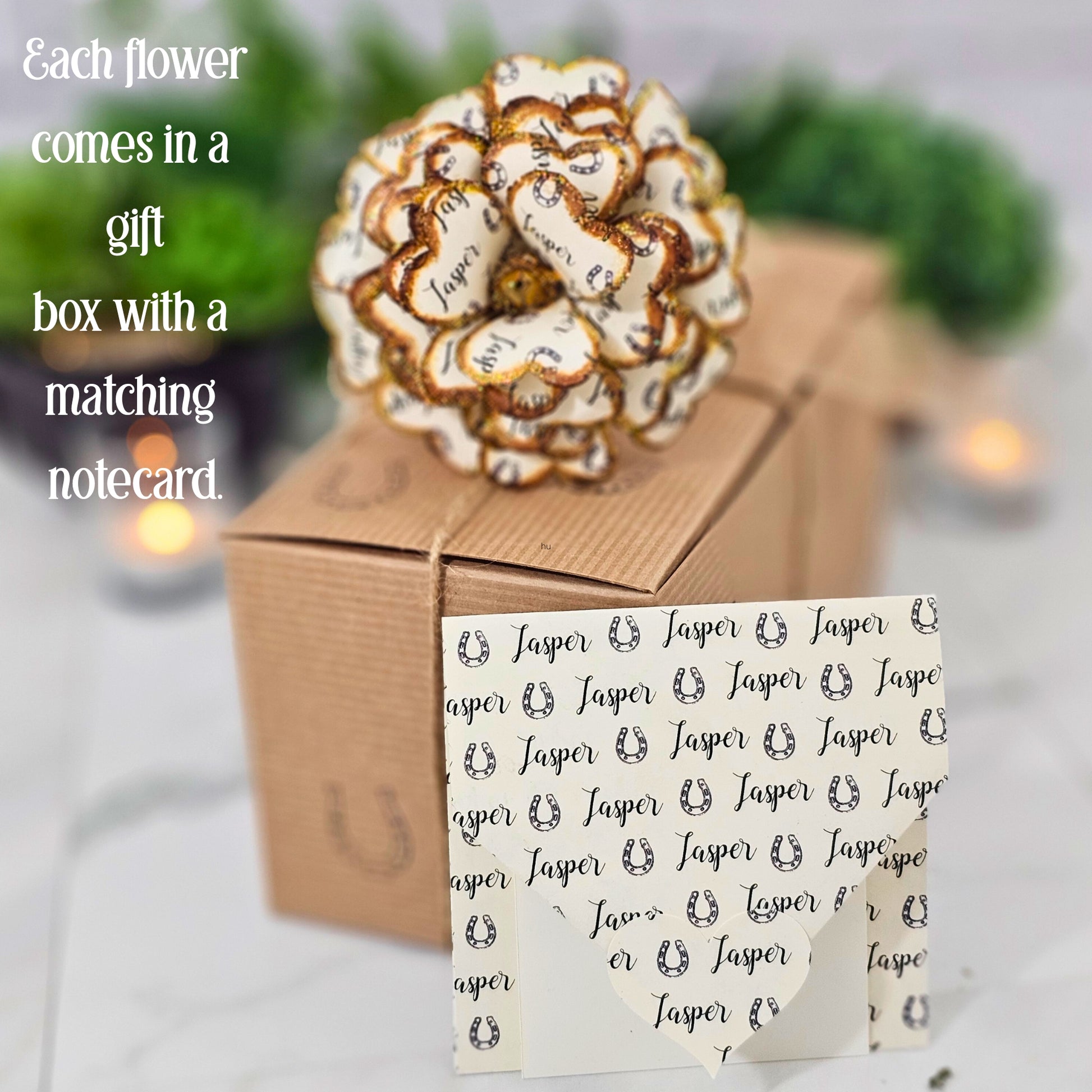 Decorative flower with matching notecard on a gift box 