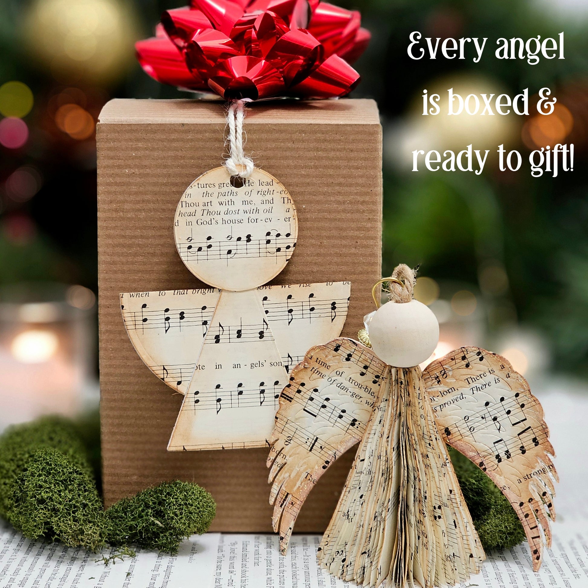 Every angel comes boxed and ready to gift as shown. The box is brown kraft, red bow and an angel gift tag made from hymn pages.
