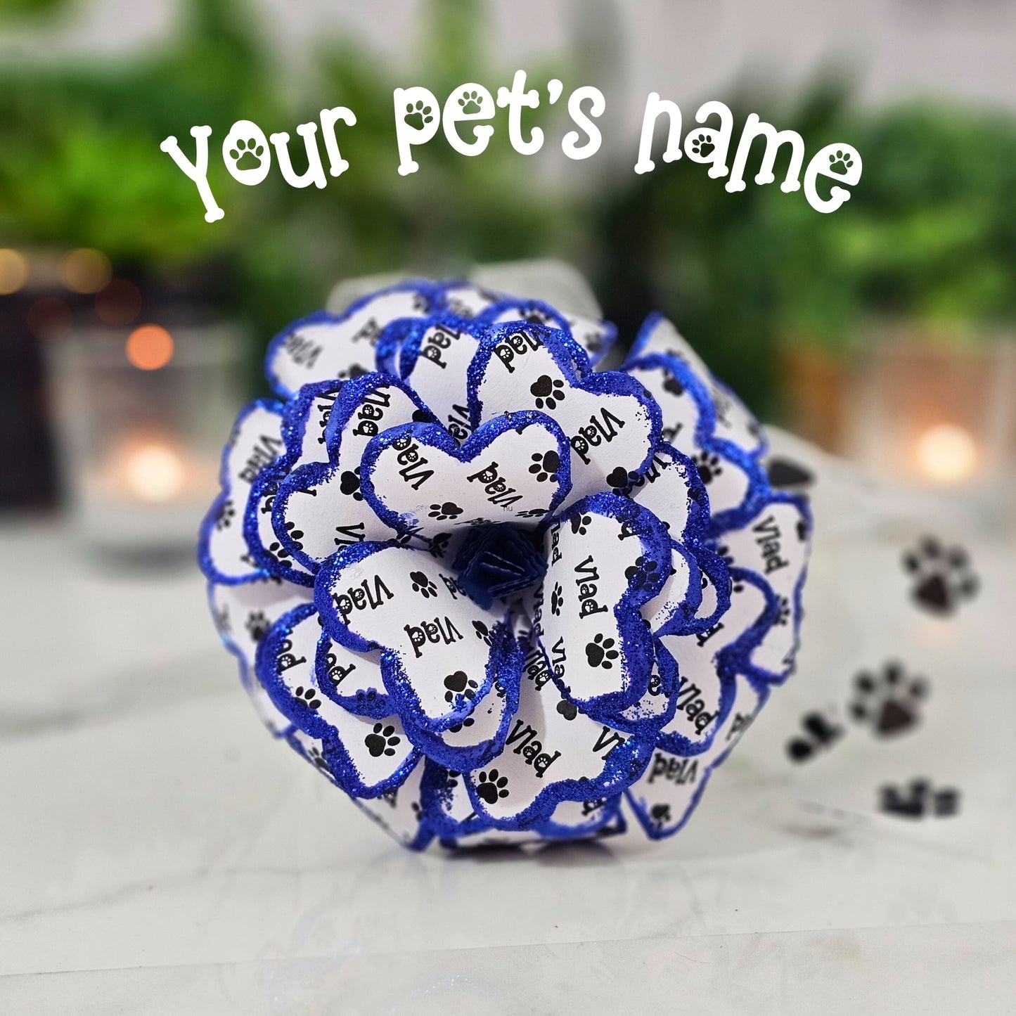 Personalized pet memorial rose with custom pet name on it, finished with paw print ribbon