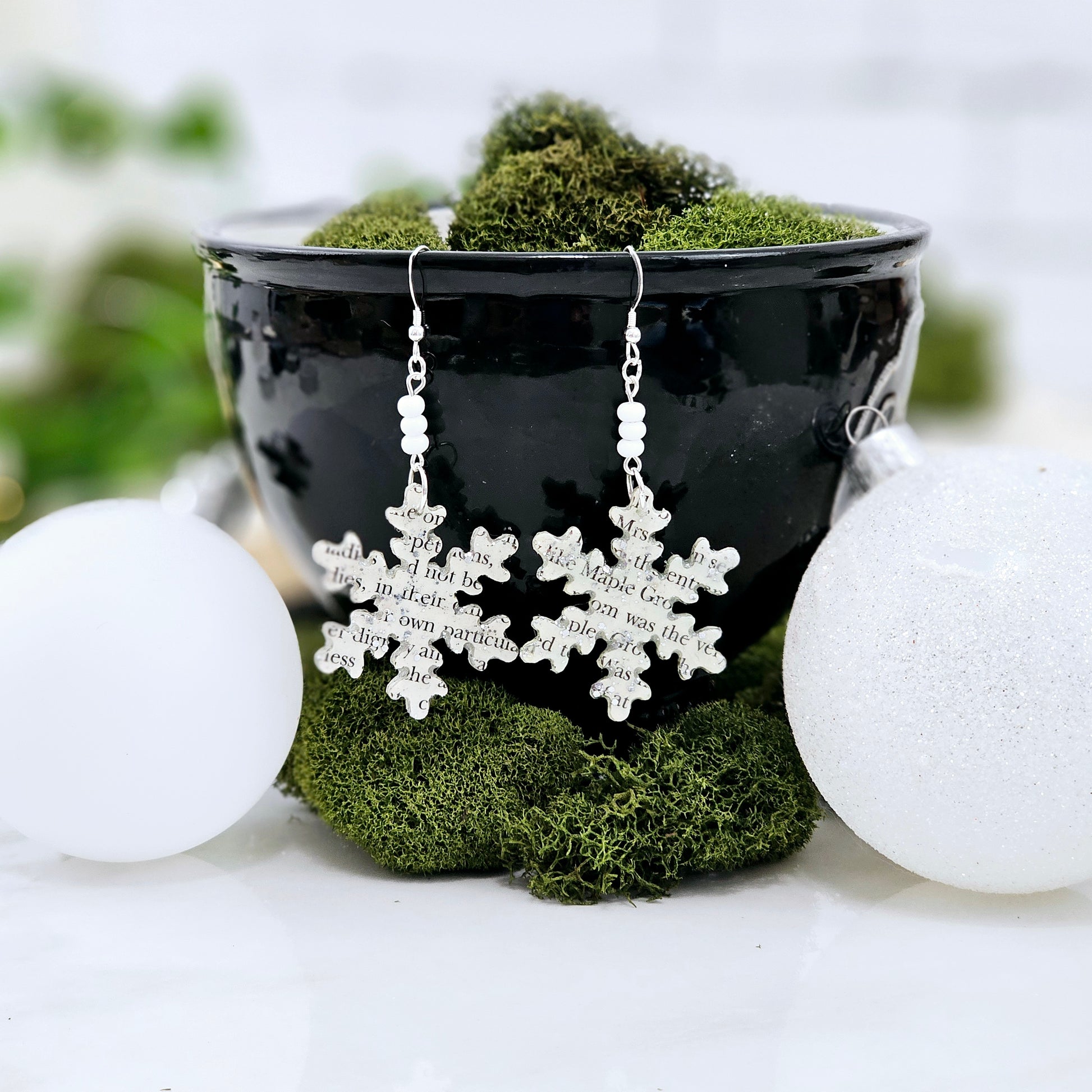 Book Page snowflake earrings with glass seed beads.  Made from A Christmas Carol by Charles Dickens