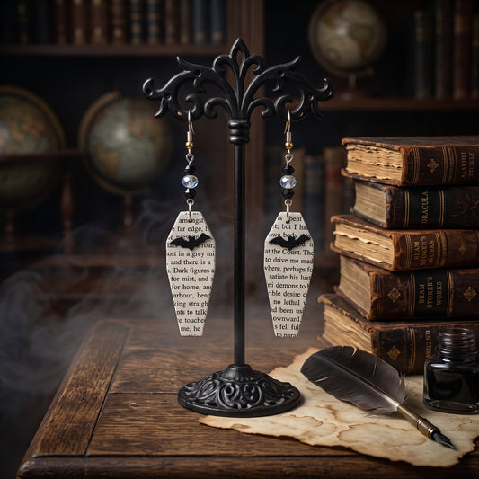 Coffin book page earrings made from pages of Dracula

