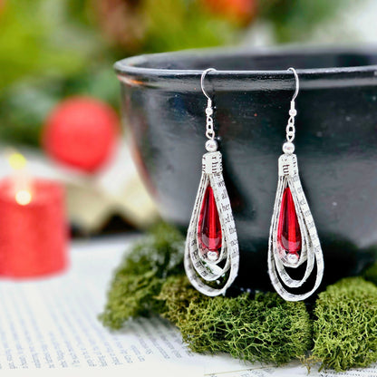 Upcycled book page teardrop earrings with red glass bead accent
