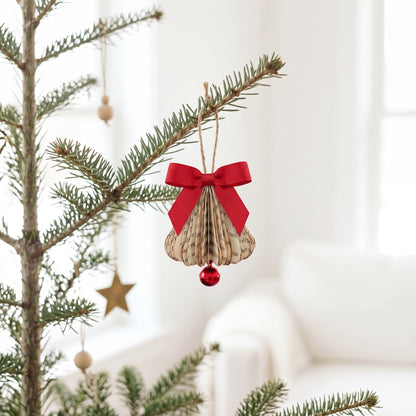 tiny book page bell christmas ornament wiht red satin bow and tiny jingle bell