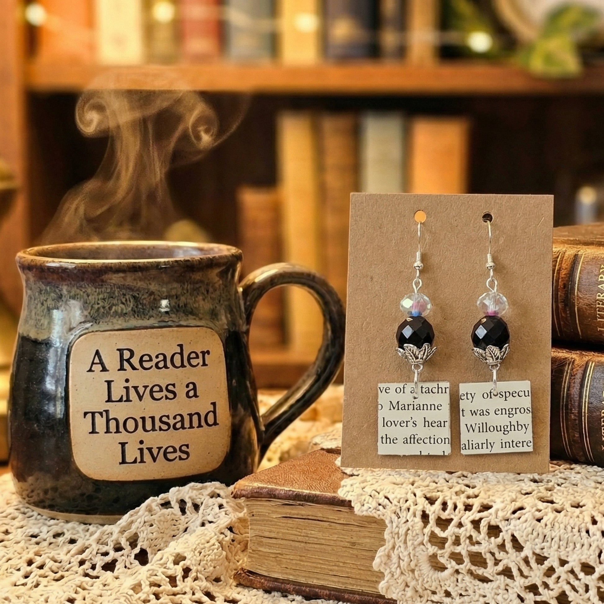 square book page earrings with black glass bead accent.