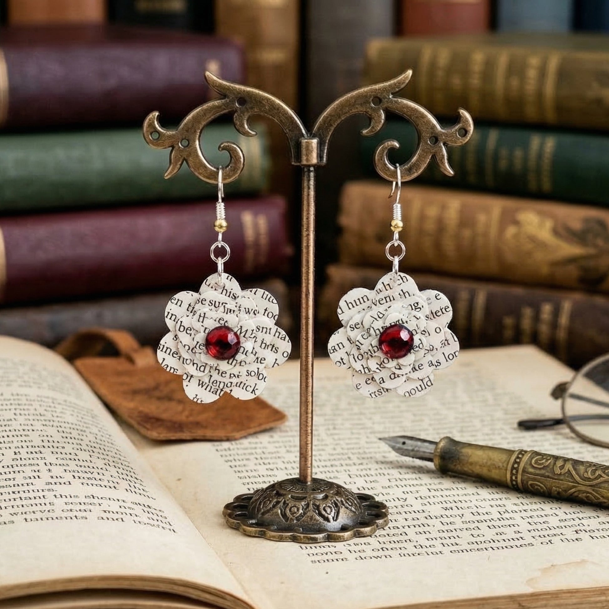 close up shot of earrings hanging on a earring tree, gift for teacher appreciation week