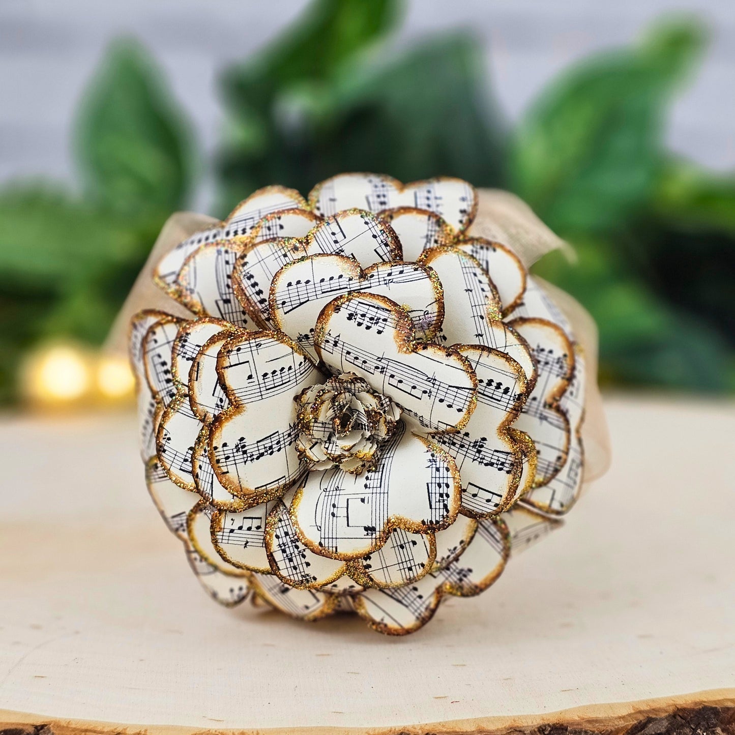 Close up of handmade paper sheet music rose in a vintage style for music room decor idea