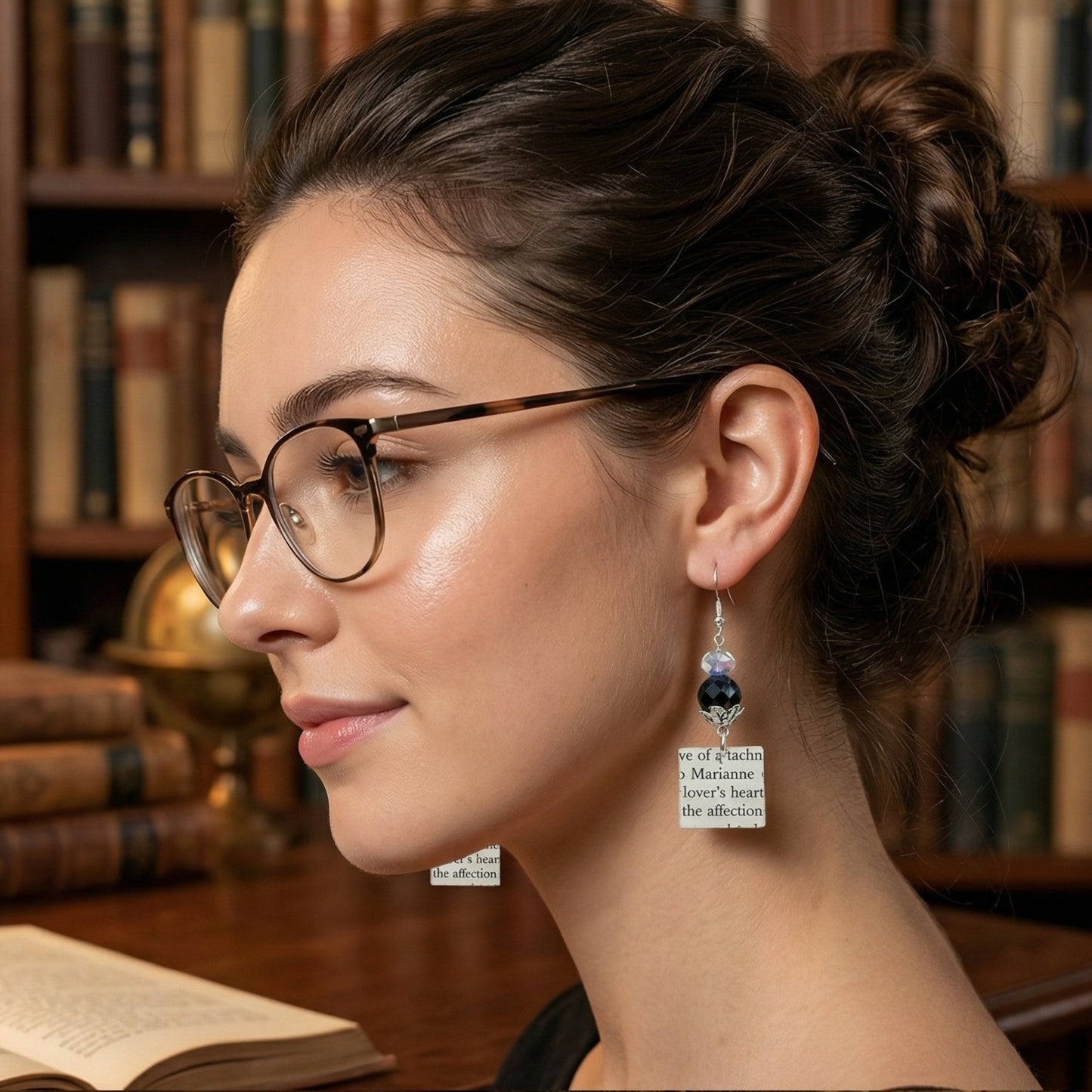 modeled photo of book page earrings