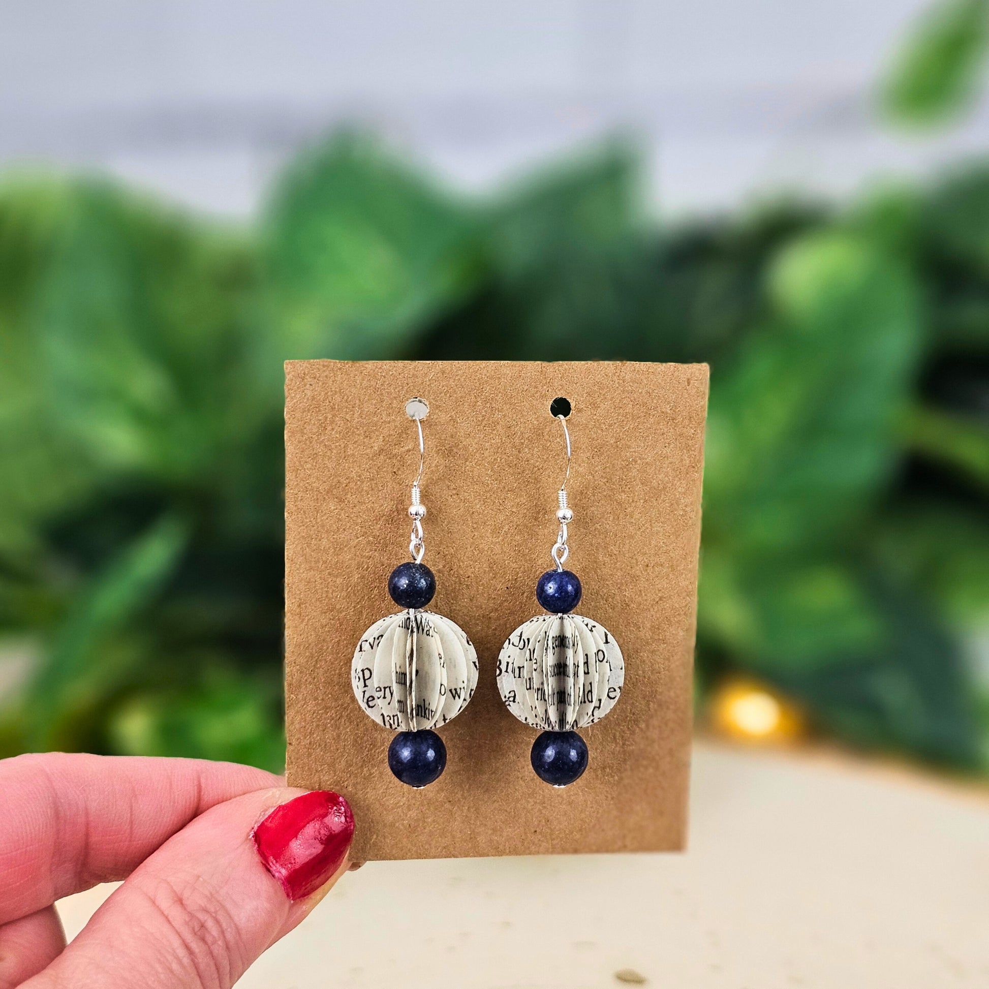 Book page bead earrings showing glass bead accent and sterling silver ear wires