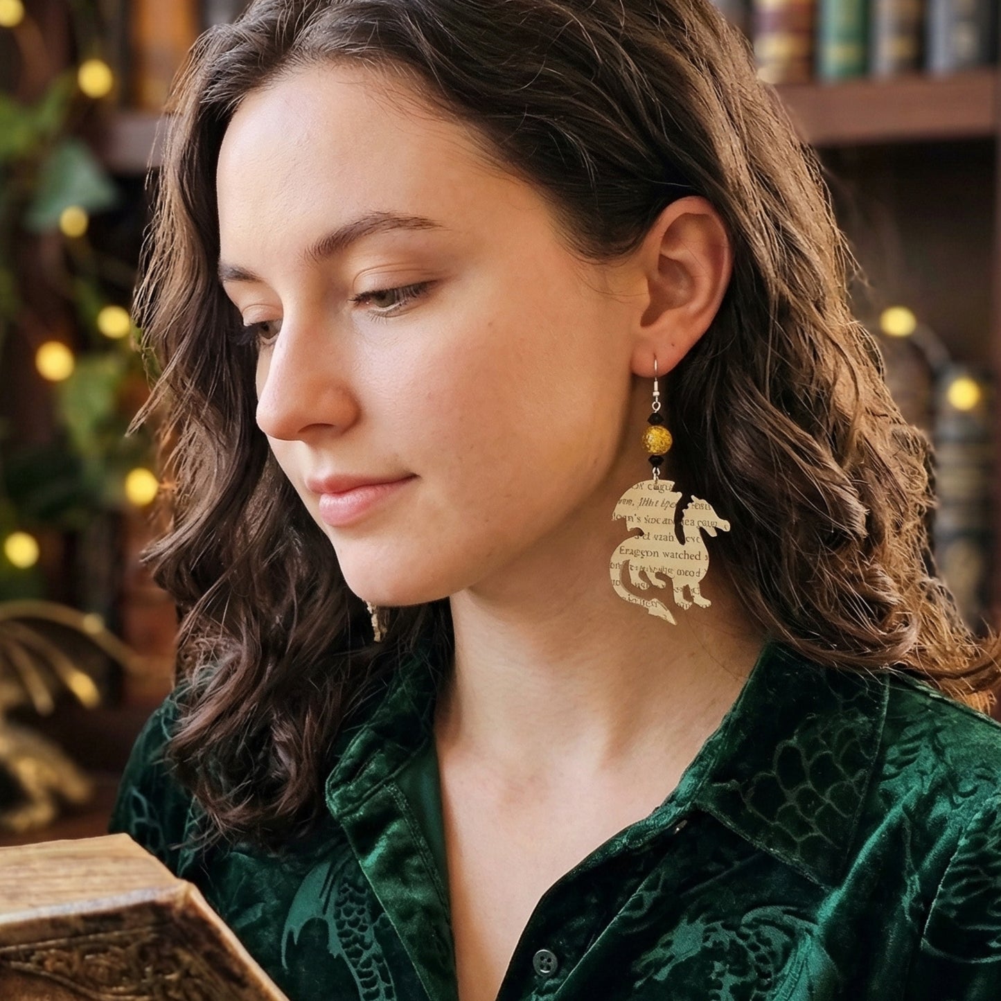 modeled photo of dragon earrings