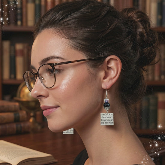 video of book page square earrings