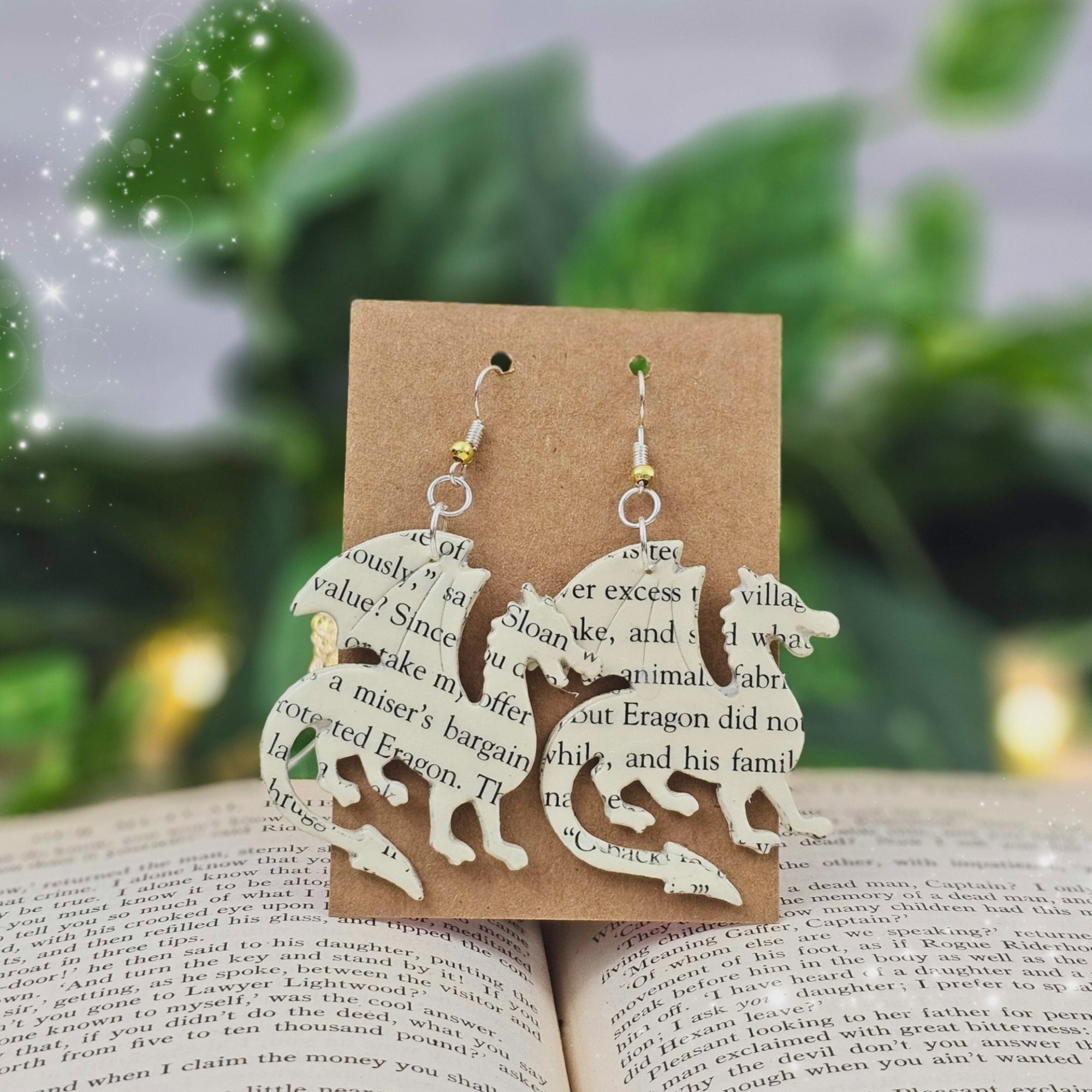 upcycled dragon shaped literary earrings