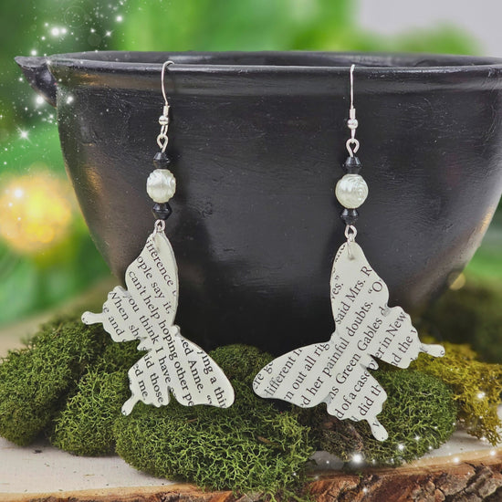 Video demonstration of handmade butterfly book page earrings showing detail and craftsmanship