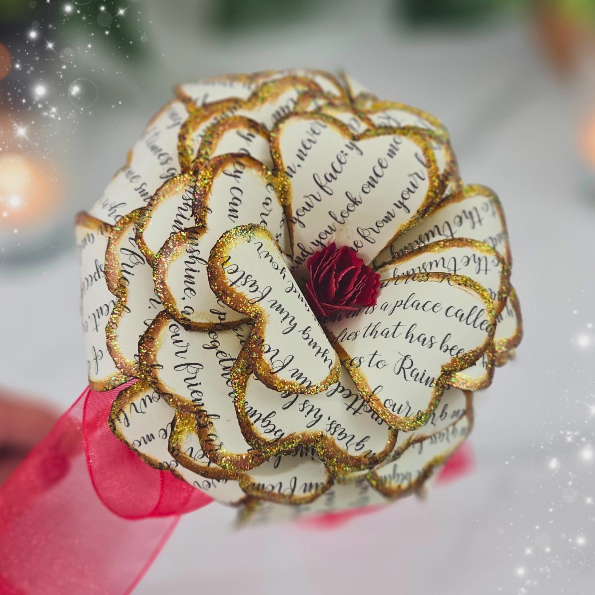 video of rainbow bridge flower, artisan made from paper with the rainbow bridget poem painted on it, comes boxed and ready to gift