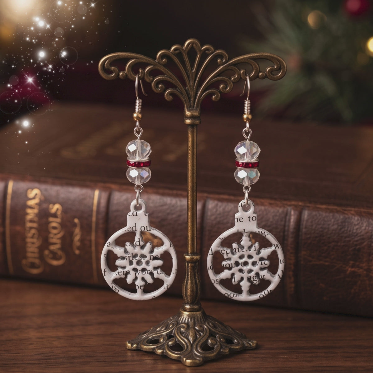 book page snow flake earrings, dangles with glass bead accents, made from the pages of A Christmas Carol
