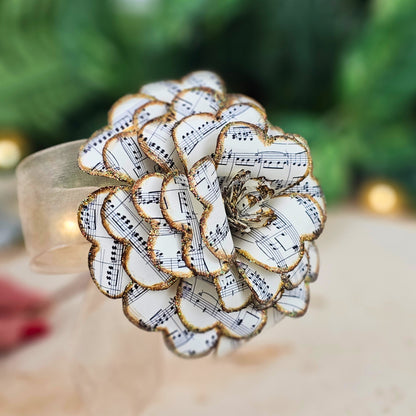 Handmade sheet music paper rose with vintage finish and sparkle accents
