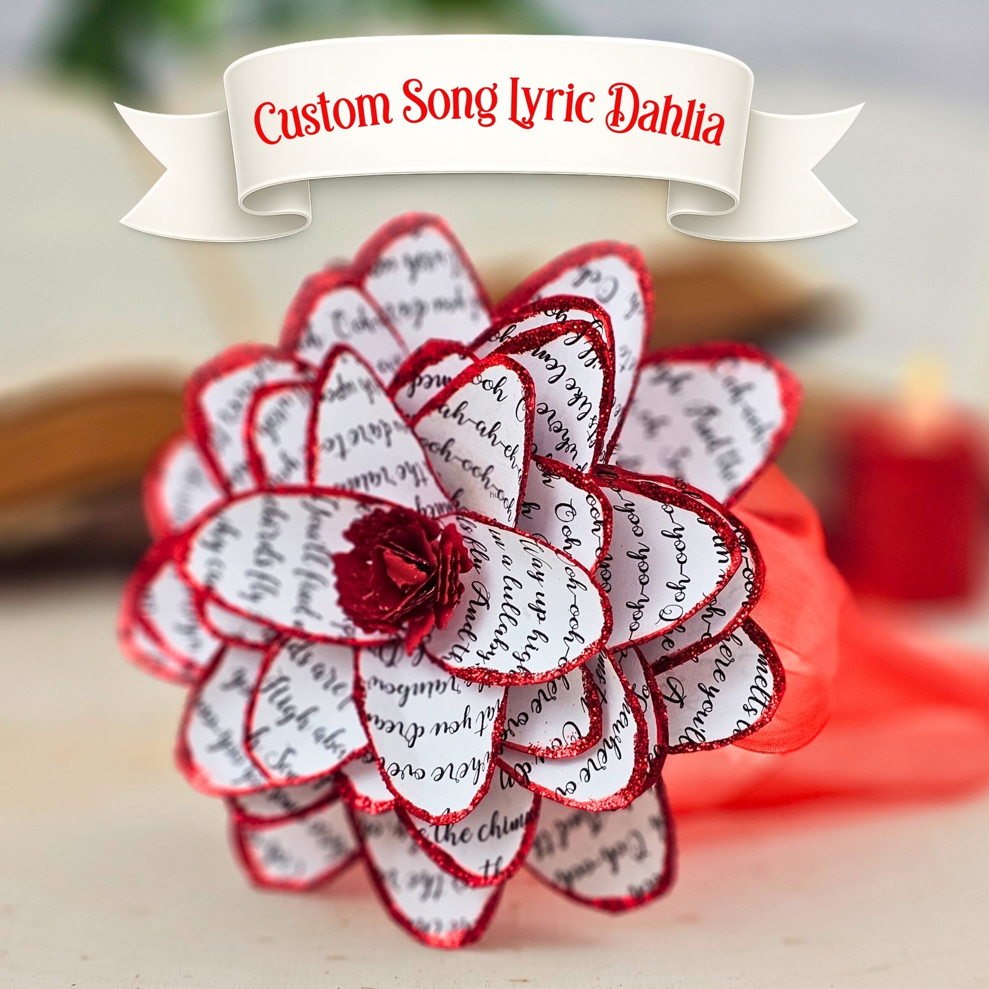 custom song lyric paper dahlia printed on white paper with red sparkly trim
